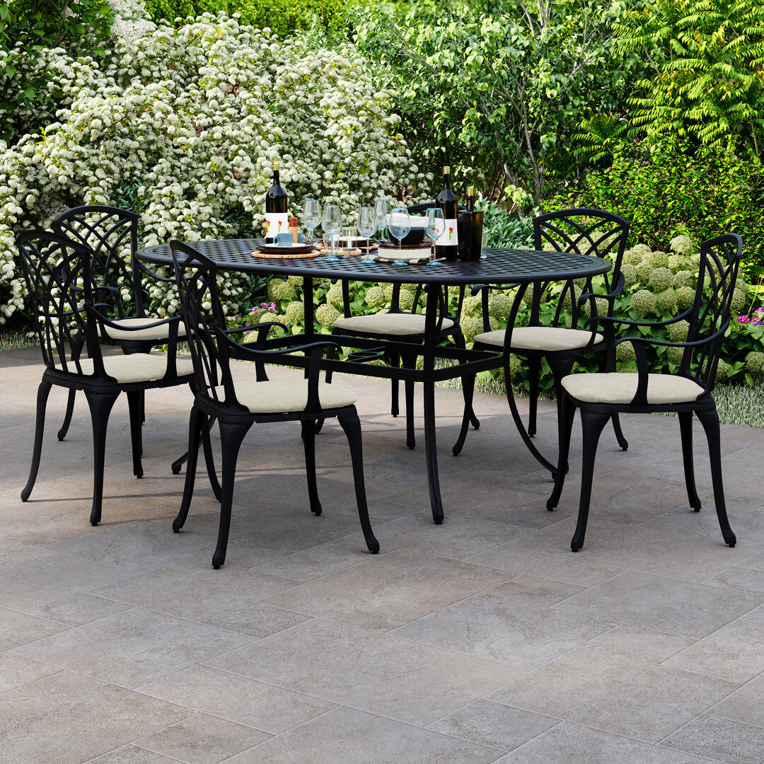 Charles Bentley Dante 6 - Person Patio Dining Set Umbrella Hole Included Oval Table with Cushions Included Bronze 6