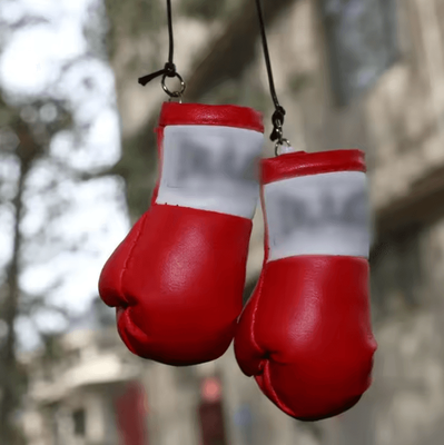 Inspire Curations Festive Knockout Boxing Glove Car Mirror Pendant red