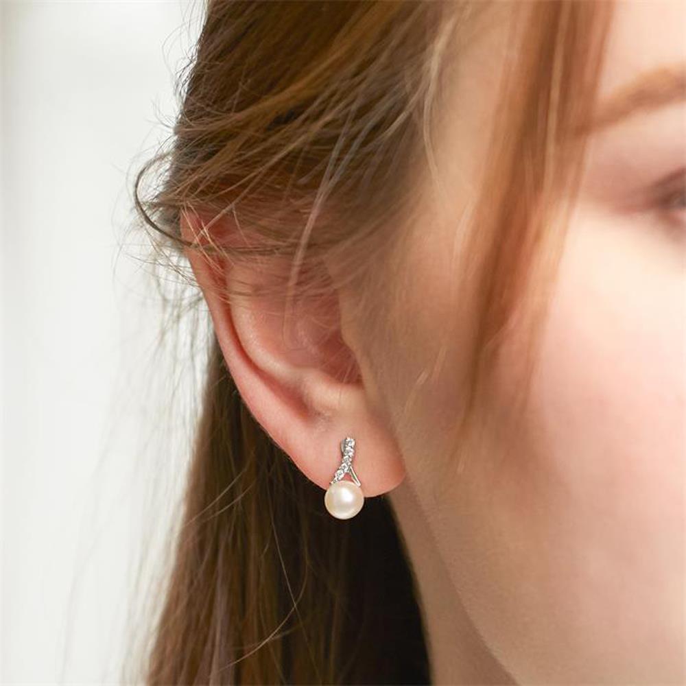 Unique Ohrstecker aus 585er Weißgold mit Perlen und Diamanten silber