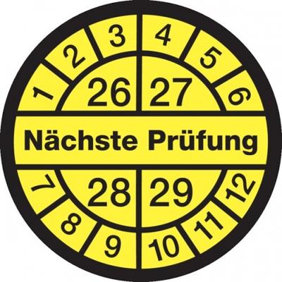 König Werbeanlagen Prüfplakette ab 26, Nächste Prüfung, schwarz/gelb, Folie, Ø 12,5/30 mm - Bogen = 10 Plaketten - 13 mm Folie selbstklebend