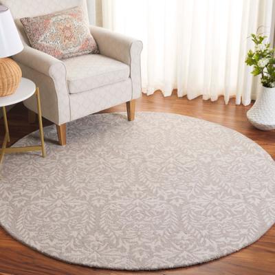 SAFAVIEH Hand-Tufted Ebony Melia Modern & Contemporary Wool Rug