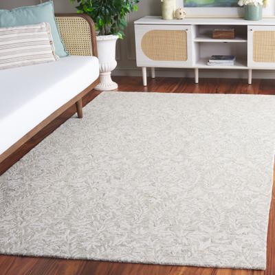 SAFAVIEH Hand-Tufted Ebony Melia Modern & Contemporary Wool Rug