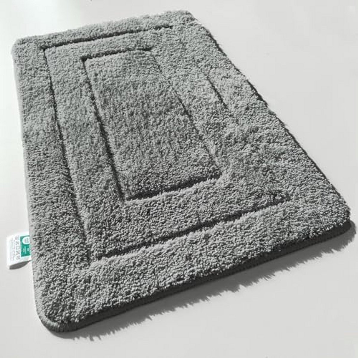 Fluffy en sneldrogende badmat met antislip achterkant in donkergrijs, 70 x 120 cm
