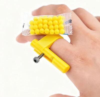Useful Little Things Hidden Mini Plastic Bullet Launcher Safe Paper Ball Launch Toy Gun & Fun Prank Gadget yellow