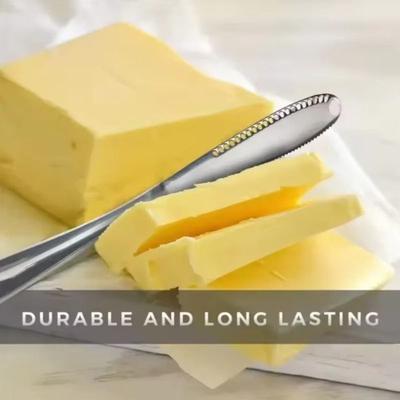 Stainless Steel Butter And Cheese Spread Knife With Non Stick Hole Design black