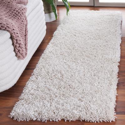 SAFAVIEH Handmade Classic Shag Nakhshun Rug