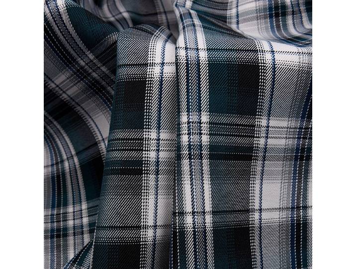 Le tissu de la jupe à carreaux uniforme est un tissu teint en polyester et plissé avec un style universitaire