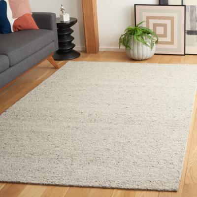SAFAVIEH Handmade Himalaya Jinia Solid Wool Rug