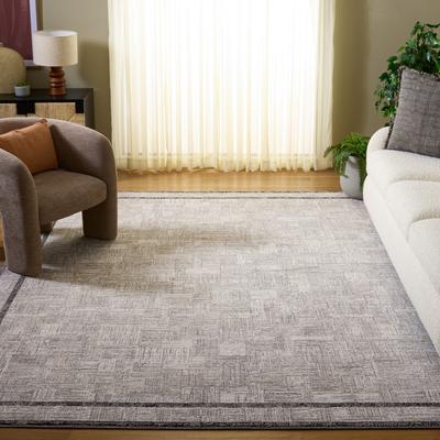 SAFAVIEH Jade Helmy Modern Geometric Border Rug