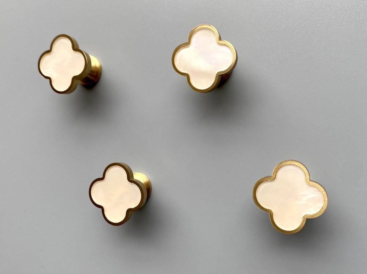 Set van 4 messing wandhaken met elegante schelpvorm
