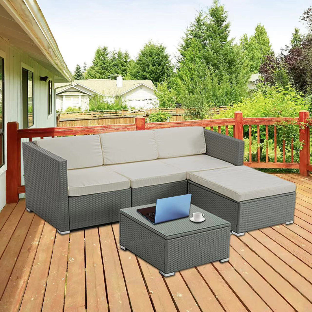 Ebern Designs Rattan Garden Sofa Set With Glass Top Coffee Table Grey Rupert/Cream 4