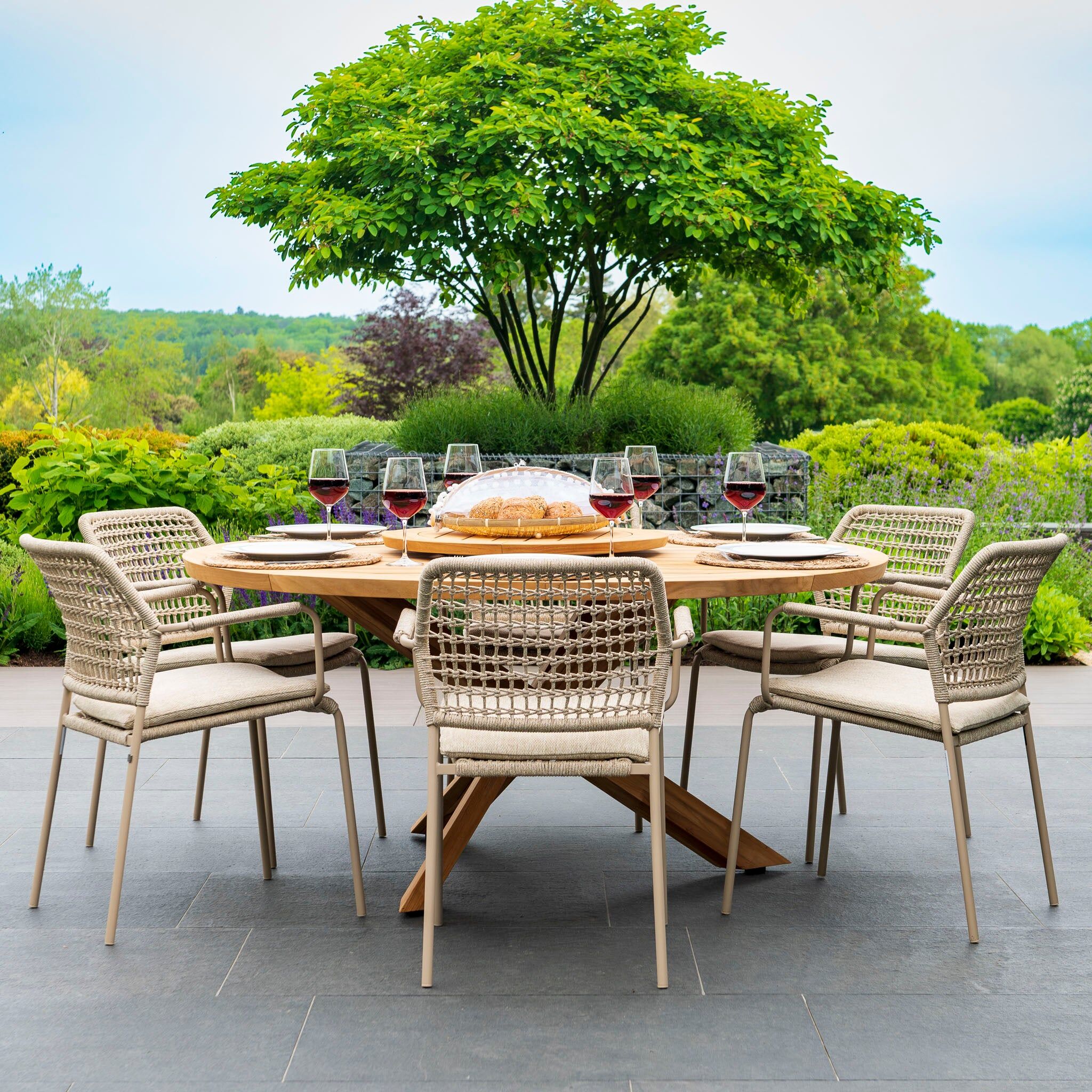 4 Seasons Outdoor Barista 6 Seat Round Dining Set with Lazy Susan in Latte