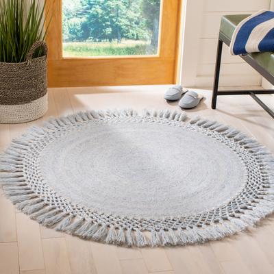 SAFAVIEH Handmade Sahara Promila Tassel Rug