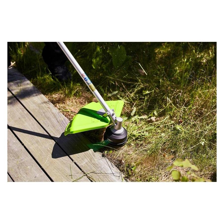 Greenworks GD24X2TX Trimmer 2x24V egnet til vedhaeftning - uden batteri og lader - Without battery an (Trimmfaden) (100046299)