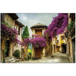 Wallario Gartenposter ca. 60 x 90 cm Malerische Stadt in der Provence mit bunten Blumen
