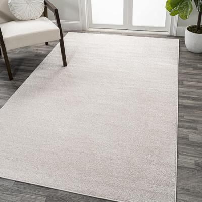 JONATHAN Y Tumbling Solid Low-Pile Area Rug