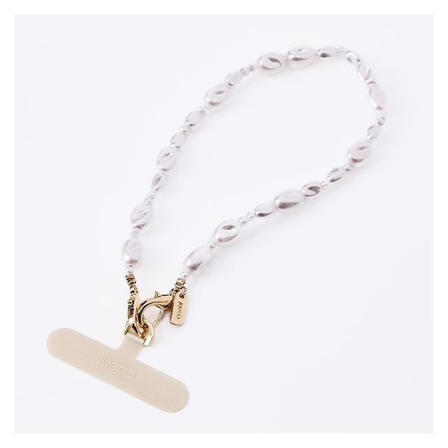 Uniq Coehl Perla Handstrap uniwersalny sznurek do telefonu na rękę biały/white pearl (UNIQ)