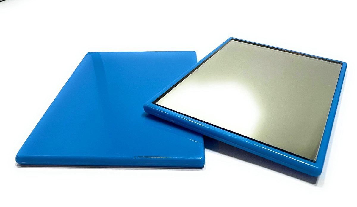 Handspiegel met turquoise-blauwe kunststof behuizing voor volwassenen
