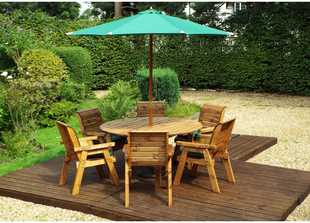 Union Rustic Faust 6 - Person Solid Wood Patio Dining Set Umbrella Hole Included Round Table with Cushions Included Green 6