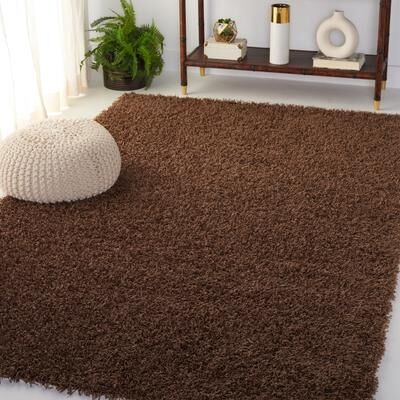 SAFAVIEH Handmade Monterey Shag Mevlide Solid Polyester Rug