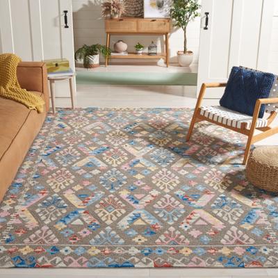 SAFAVIEH Handmade Micro-Loop Gundelinde Wool Rug