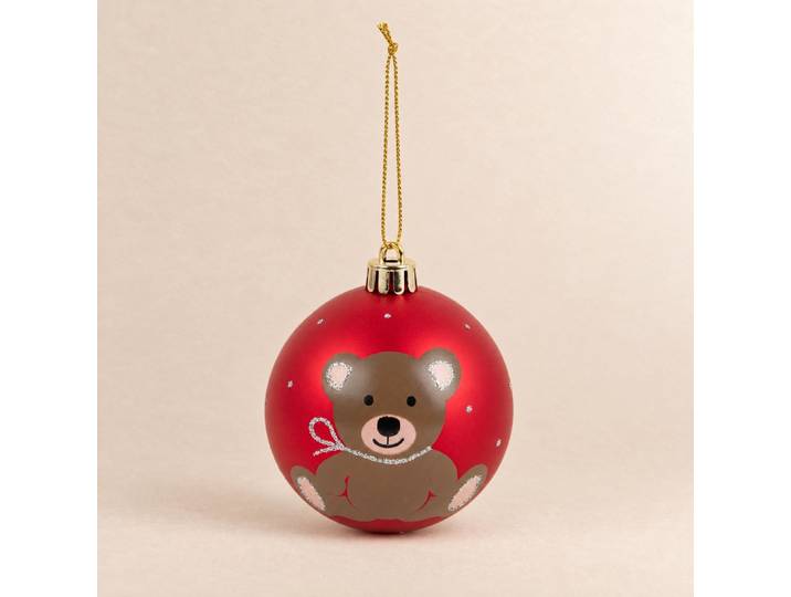 Rote Weihnachtskugel mit braunem Teddybärmuster