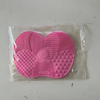 Uplifted Goods Silicone Apple Shaped Makeup Brush Cleaner Pad With Suction Cup pink