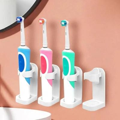 Uplifted Finds Non Slip Wall Mounted Traceless Toothbrush Stand Holder Adjustable Space Saving Bathroom Toothbrush Rack pink 1 Pc