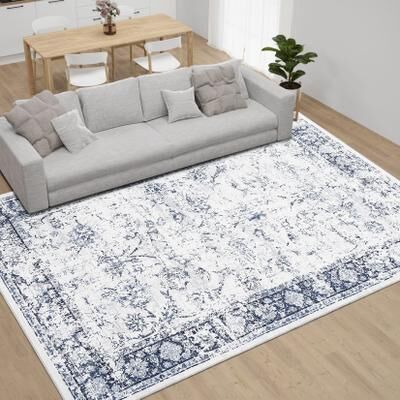 Garvee Faded Distressed Medallion Area Rug