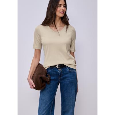 Kurzarmshirt STREET ONE "Style Palmira", Damen, Gr. 40, beige (cotton beige), Jersey, Obermaterial: 50% Baumwolle, 50% Modal. Futter: 100% Baumwolle, unifarben, slim fit hüftlang, tiefer Rundhals, abgesteppt, Shirts, mit tiefem Rundhalsausschnitt