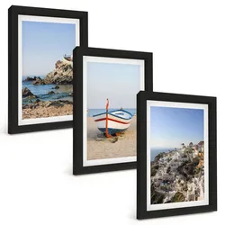 BILDER SET 3er Set - 20x30 cm Schwarzer Rahmen - Ansichten von Griechenland mit einem Boot und Häusern