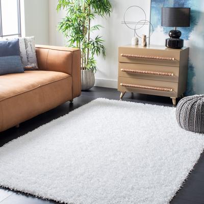 SAFAVIEH Handmade Monterey Shag Mevlide Solid Polyester Rug