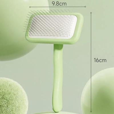 Uplifted Goods Pet Hair Remover And Massage Brush For Cats And Dogs green