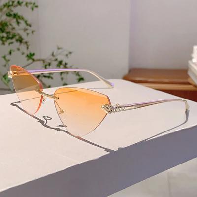 Inspired Living Vintage Y2K Rimless Triangle Cat Eye Sunglasses Retro Punk Designer Shades orange