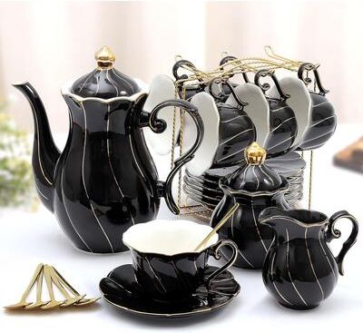 KitchenNation 22 Piece Porcelain Tea Set For 6 Luxury British Style Tea & Coffee Cups With Golden Trim elegant Black