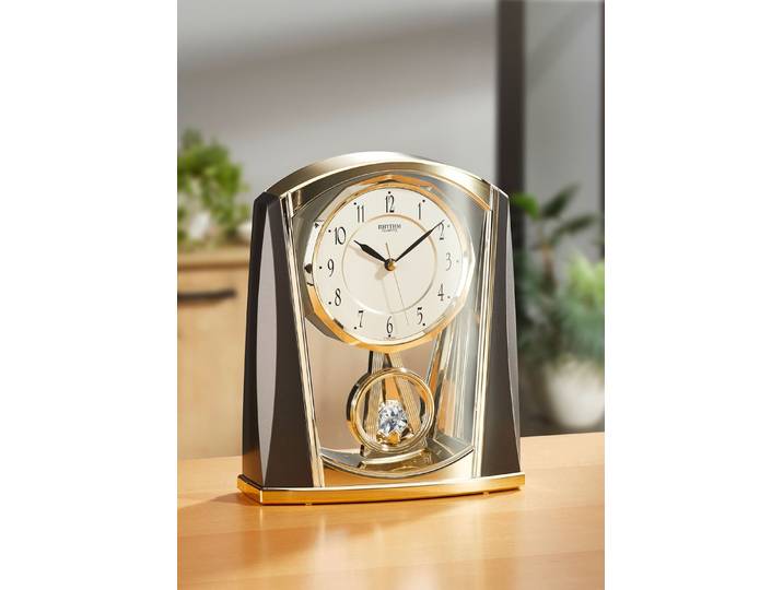 Tischuhr aus Kunstmaterial, Gold