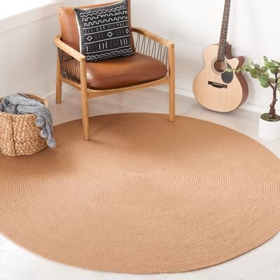 SAFAVIEH Handmade Braided Thanja Rug