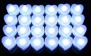 Inspired Living 24 Pack Flameless LED Tea Lights Warm White Flickering Battery Operated Candles For Wedding And Home Decor heart White Light 24 pack