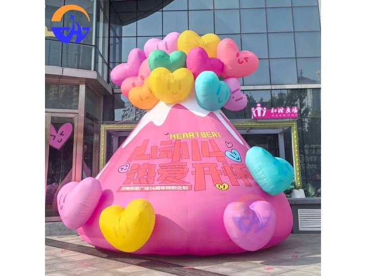 Dessin animé gonflable personnalisé grand volcan coeur coloré lumineux accessoire de décoration gonflable pour centres commerciaux espaces extérieurs