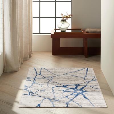 Calvin Klein River Flow Contemporary Abstract Ivory Blue Area Rug