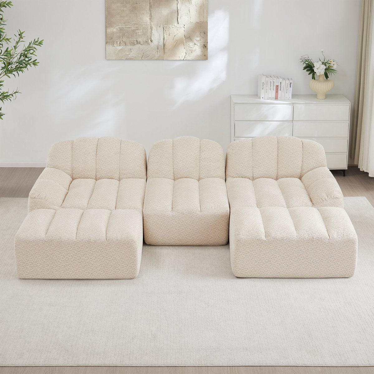 Modulaire U-vormige 3-zits bank met 2 poefs in beige wit teddy stof voor de woonkamer