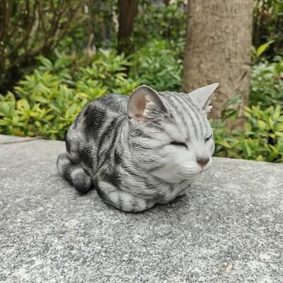 Hi-Line Gift Tabby Tranquility: Whimsical Black Polyresin Napping Cat Figurine