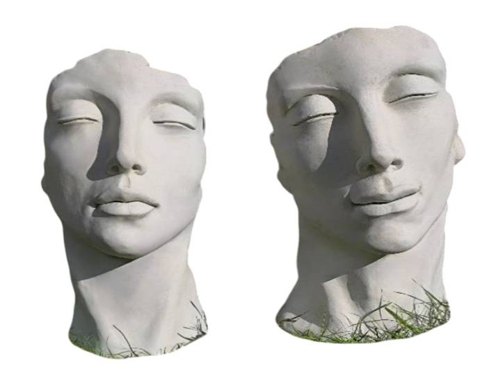 Paire de visages décoratif de jardin