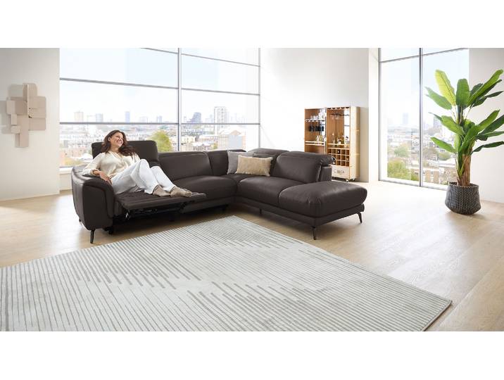 Leder Couch mit motor. Relaxfunktion und Kopfteilverstellung