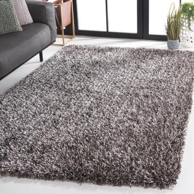 SAFAVIEH Handmade New Orleans Shag Triin Area Rug