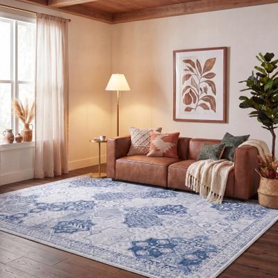 SAFAVIEH Tucson Machine Washable Slip Resistant Riza Rug