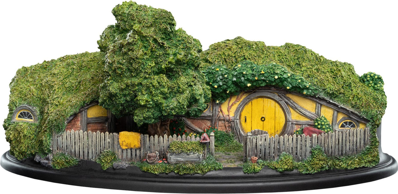 Weta Workshop Gandalf mes en Hobbit-beeldje met Hobbit-hol, 14 cm en 25 cm