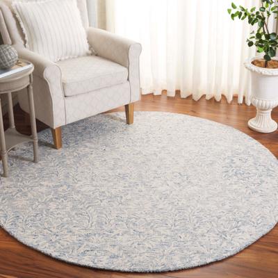 SAFAVIEH Hand-Tufted Ebony Melia Modern & Contemporary Wool Rug