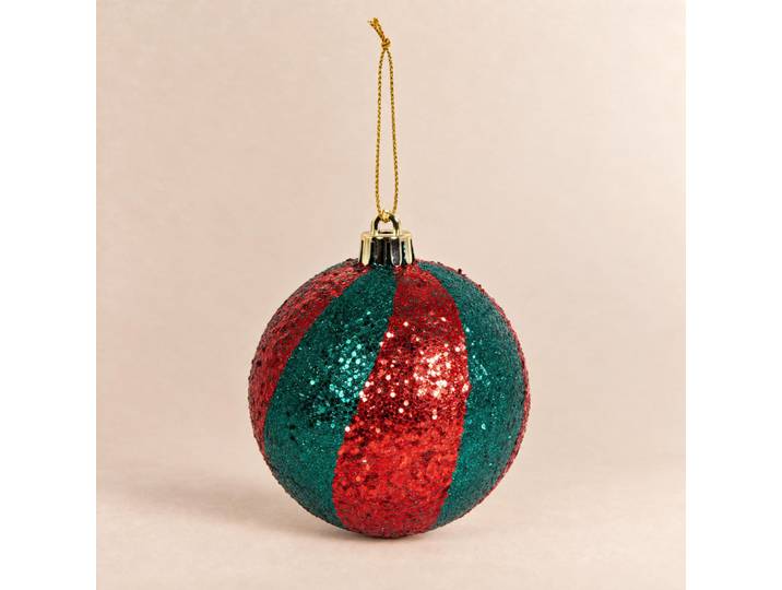 Grüne und rote glitzernde Weihnachtskugel