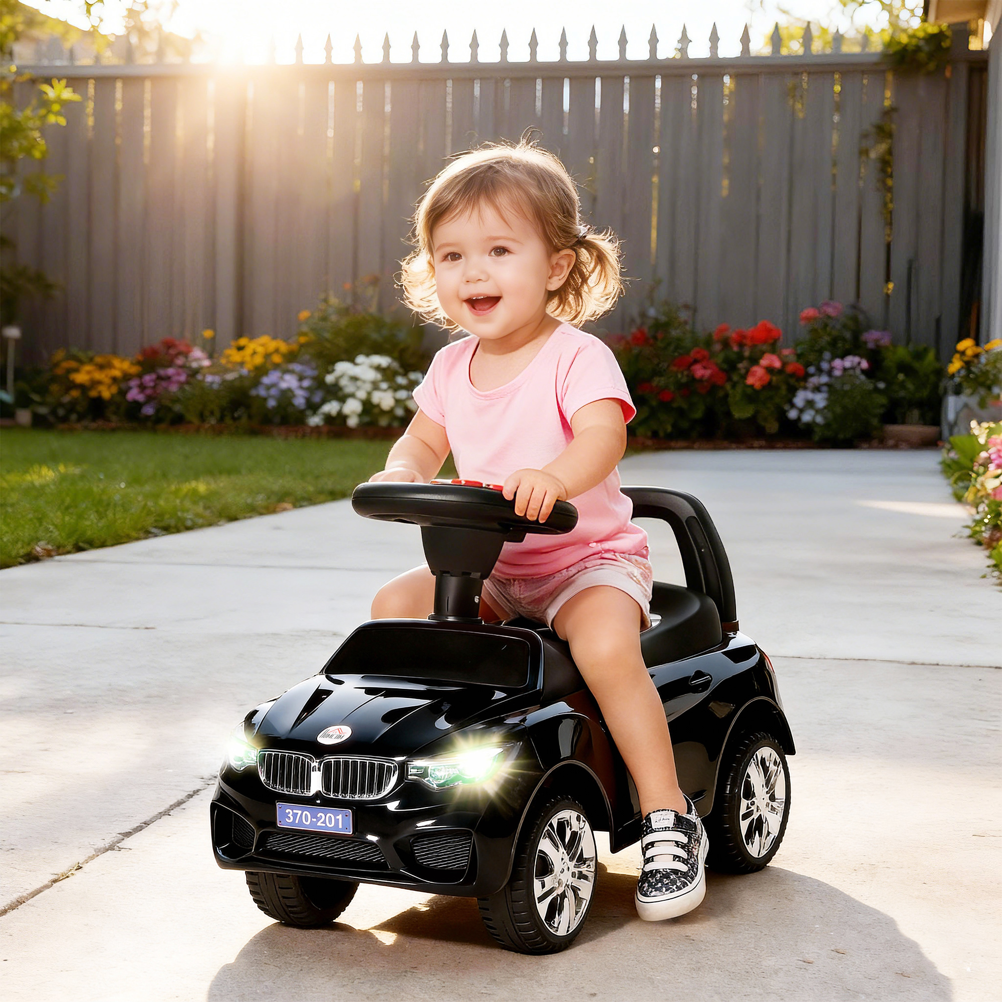 Homcom Macchinina per Bambini Cavalcabile con Volante, Fari e Musiche Integrate, in PP e Metallo, 63.5x28x36 cm, Nero